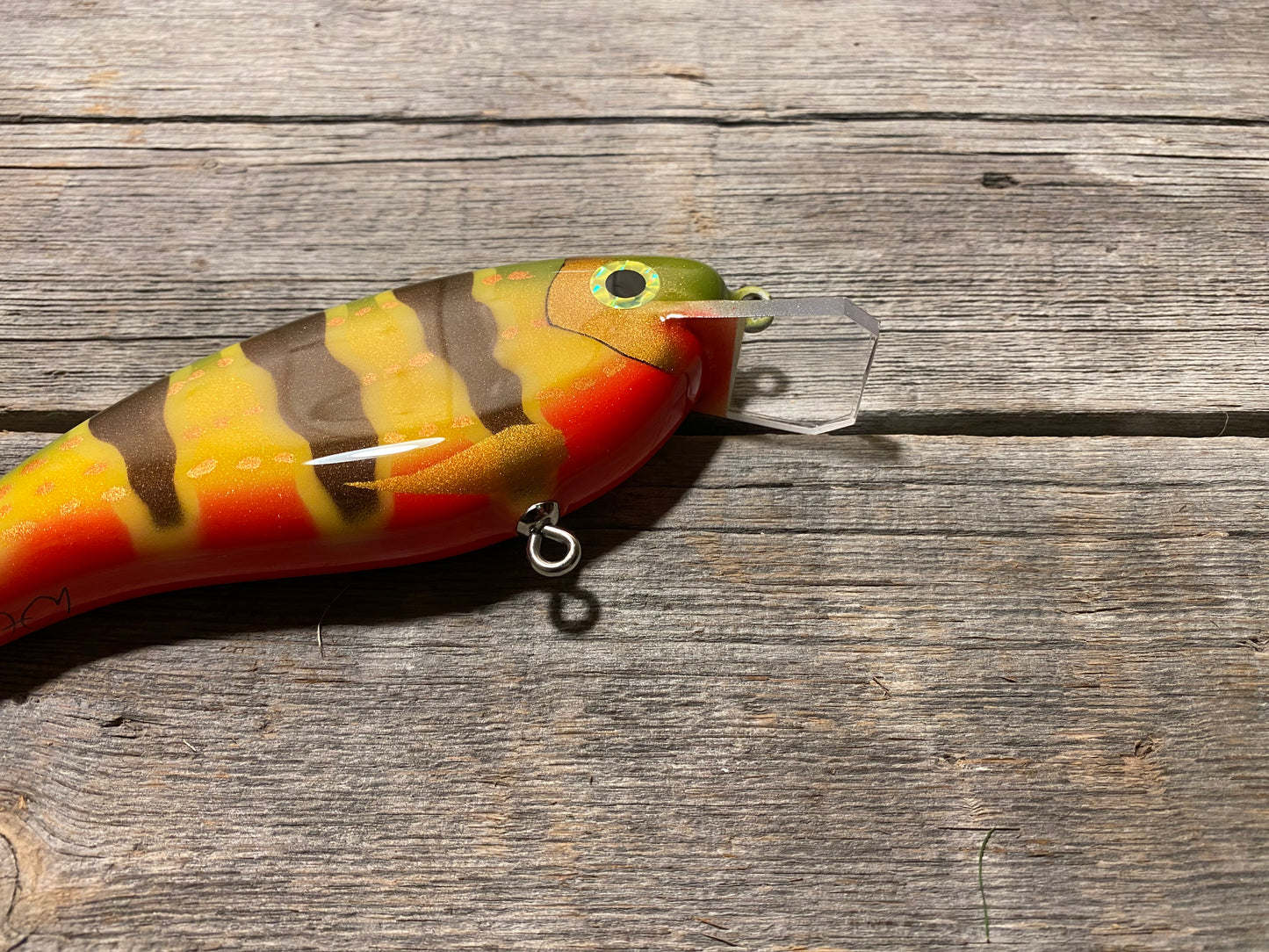 Knubbisen - Wobbler 95g / 15cm PeacockBass