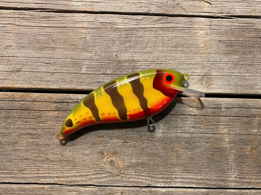 Knubbisen - Wobbler 95g / 15cm PeacockBass
